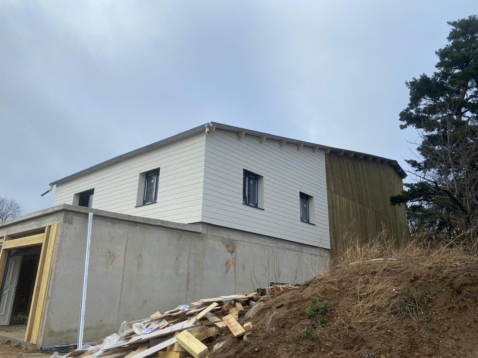 Maison à ossature bois terminée, bardage clair
